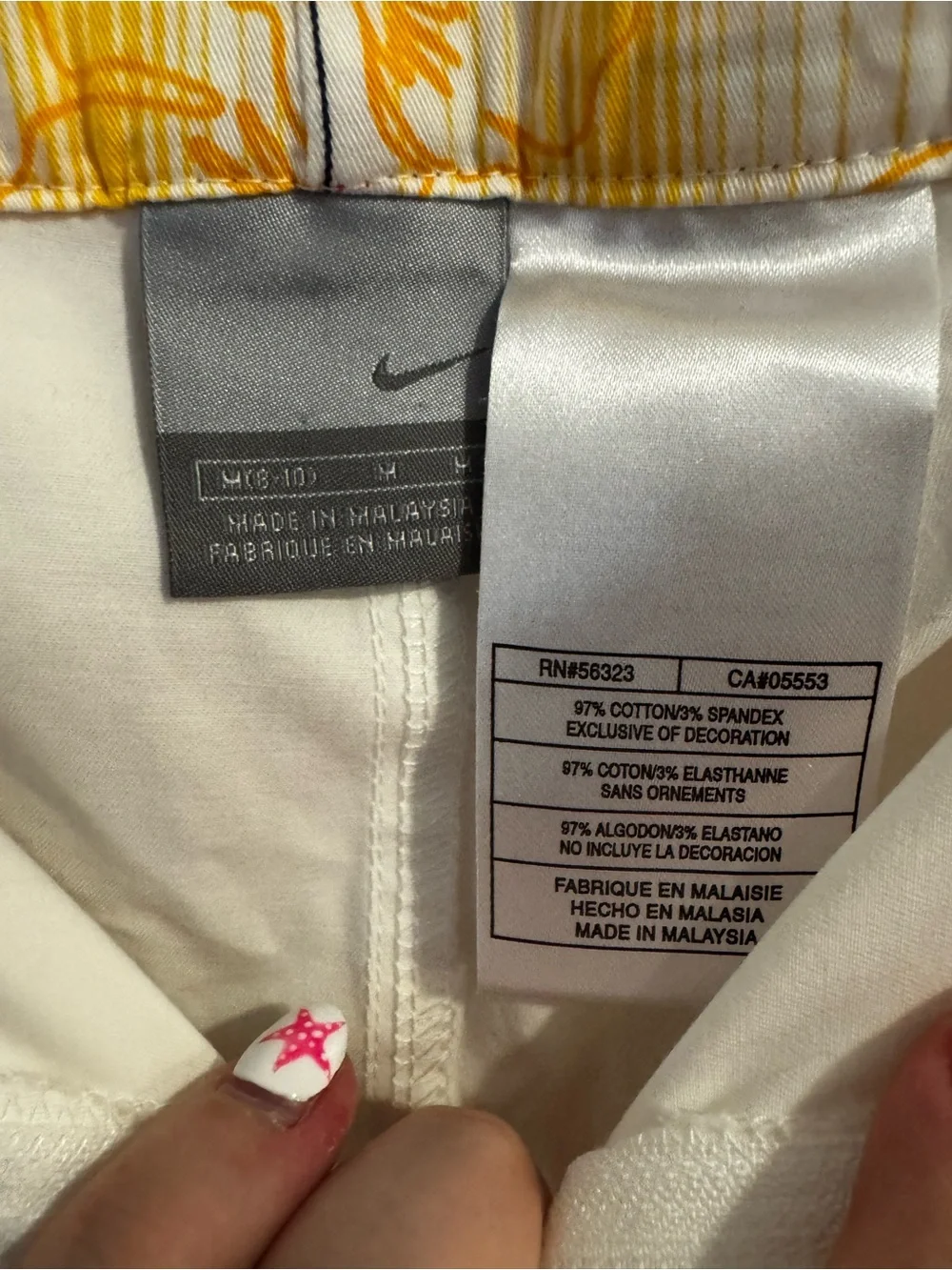 White Nike Capri Pants with Orange Trim